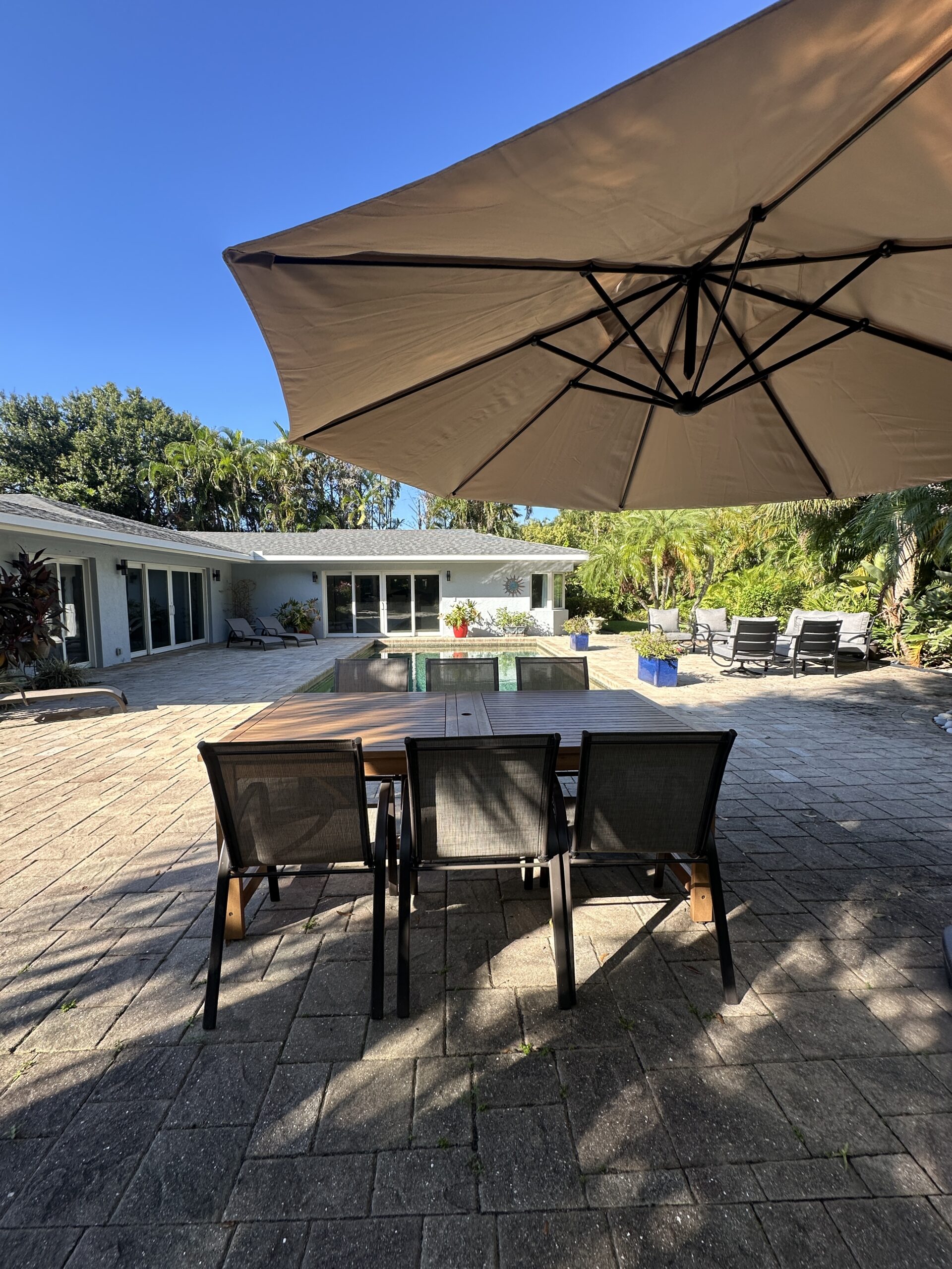 Outdoor dining table with umbrella